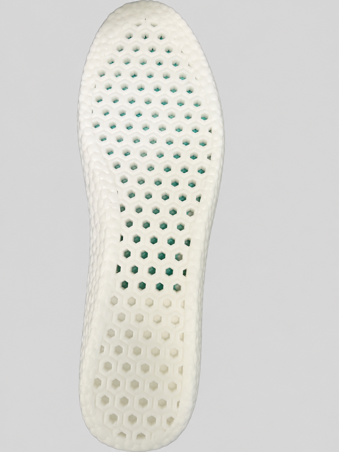 CAFFREY Odour Smart white underside with hexagonal perforations and the cushioned heel area