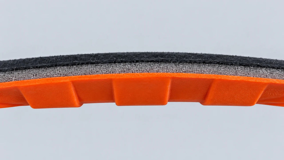 Close-up of the assembled Super Novae edge: black velvet, grey foam and orange molded base