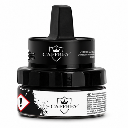 CAFFREY Brilliance Instant Shine Cream, Black, in its closed jar with raised applicator handle.